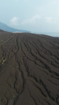 Aerial Climbing Dark Ash Slope Of Anak Krakatau Volcano Ridge