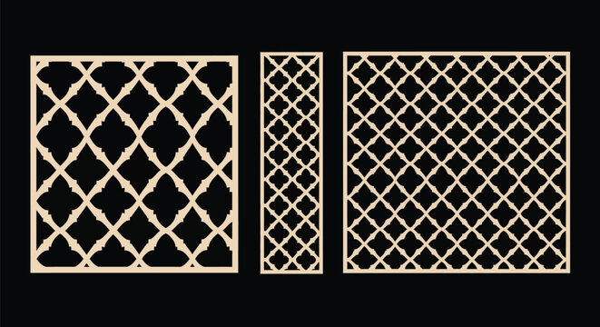 Set of three decorative laser cut screen panels with intricate arabesque quatrefoil geometric pattern beige color isolated on black background.
