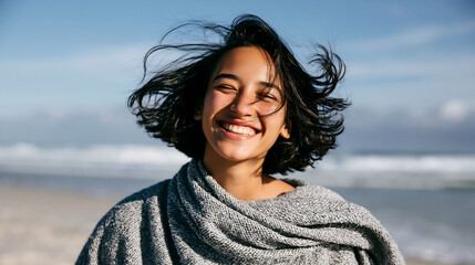 Fototapeta premium carefree woman enjoying beach moment with genuine laughter and ocean view ideal for lifestyle brand vacation travel and wellness