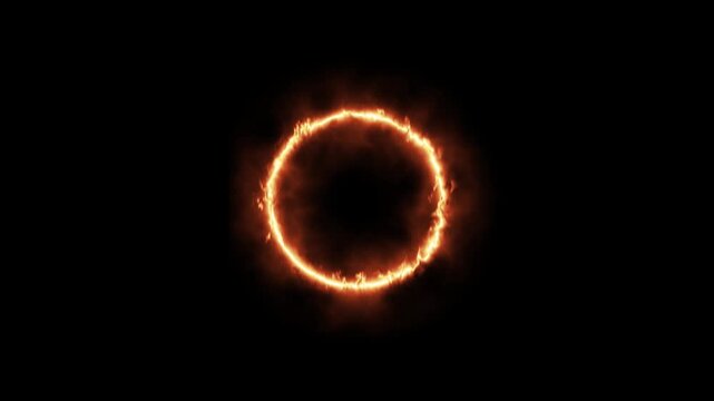 Fiery ring effect glowing circle of fire with smoke on black background abstract energy concept for motion graphics and design