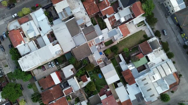 aerial drone view of mar del plata coastline and city traffic, cinematic aerial drone footage of mar del plata, argentina. ocean coastline, city buildings, residential neighborhoods and moving traffic