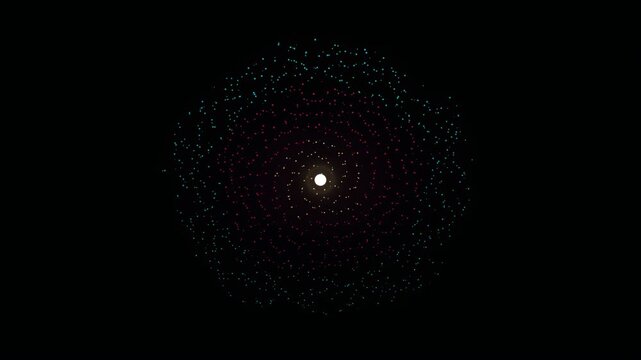 A bright light shines in a dark circular area filled with tiny particles.