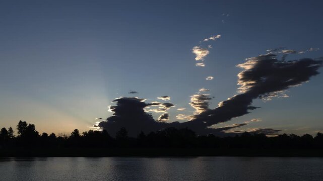 Morning Sun Emerging Behind Storm Clouds Timelapse