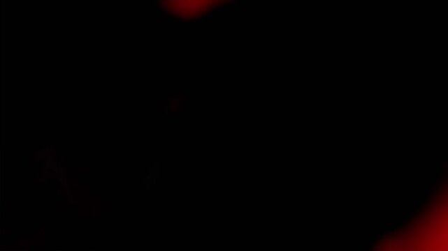 4K warm amber light leak with vintage analog film grain