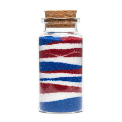 Fototapeta premium Layered Red White and Blue Sand Art in Clear Glass Jar - Creative Independence Day Craft Concept
