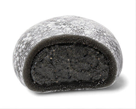 Black sesame mochi dessert cut in half