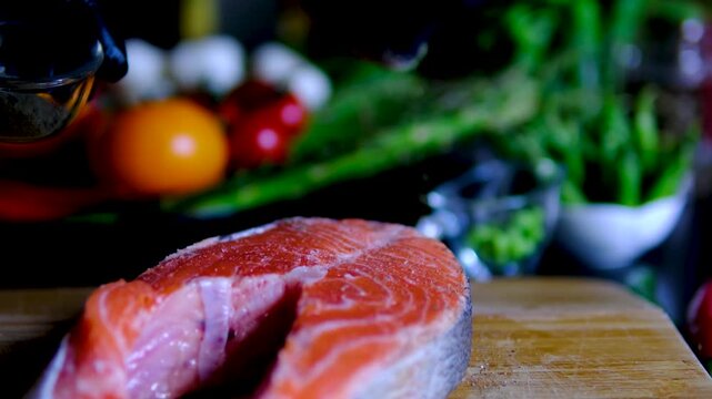 Step by step salmon recipe asparagus garlic butter cooked on stainless steel skillet in modern kitchen healthy gourmet meal preparation salmon recipe, healthy, cooking process, restaurant style meal