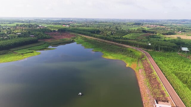 Explore Ho Cau Moi in Dong Nai, Vietnam with beautiful water and greenery