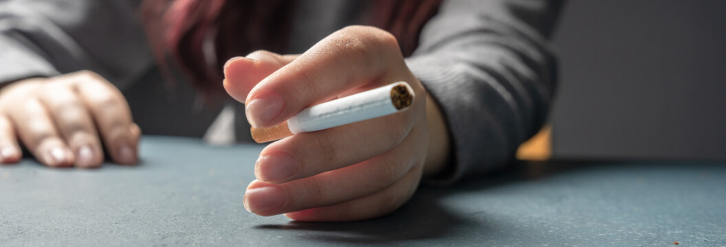 Conceptual depiction of cigarette addiction, showing dependency on smoking, highlighting health risks, habitual behavior, withdrawal struggle, and the impact of nicotine on daily life.