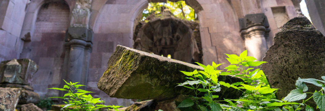 Ruined ancient church with crumbling stone walls and broken architecture, evoking history, decay, abandonment, and a haunting sense of forgotten spiritual heritage.