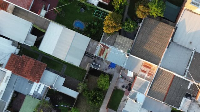 aerial drone view of mar del plata coastline and city traffic, cinematic aerial drone footage of mar del plata, argentina. ocean coastline, city buildings, residential neighborhoods and moving traffic