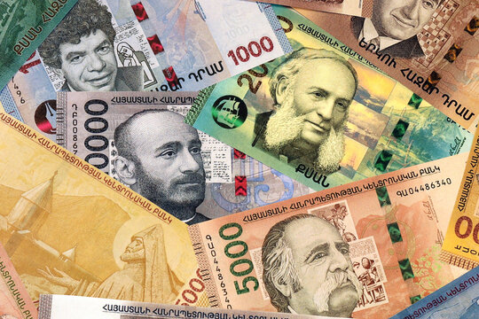 Armenian dram money bills in pile on table. Armenia AMD currency cash close up