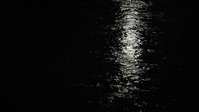 Tokyo,Japan - June 18, 2026: Heavy rain falling on a street surface at night