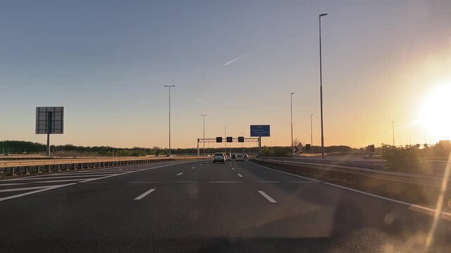 Amsterdam Netherlands highway, Evening traffic on a modern highway interchange at sunset