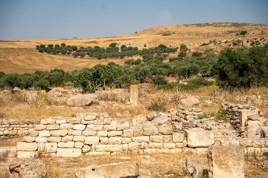 Stone wall in the Roman ruins of Dougga, in Northern Tunisia