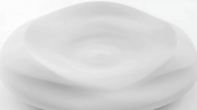 A stack of white ceramic plates.