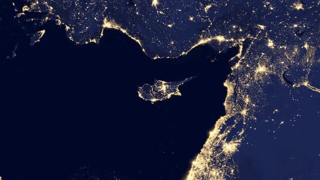 Satellite view zoom into Cyprus island at night.