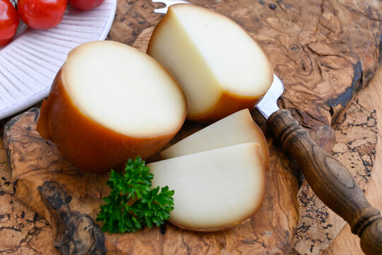 Italian cheese smoked scamorza cow milk cheese from Puglia, Italy