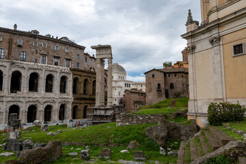 Obraz premium Architectural history in details of ruins, old buildings, walls, amfitheatres, arches in old part of Rome, dated from 300 BC, guided tours in Rome, Italy