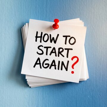 Stack of paper notes with how to start again question