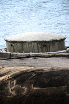 Rio de Janeiro, Brazil - 02 June 2026: View of the concrete bunker at Copacabana Fort overlooking the Atlantic Ocean with weathered stone surfaces and small observation slits.