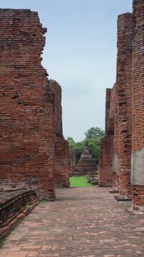 Ancient brick ruins of Ayutthaya Historical Park, Thailand. This UNESCO World Heritage site showcases historical Buddhist temple architecture.