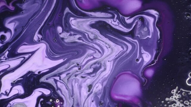 Abstract purple fluid art background with swirling liquid marble texture and dark tones, fluid art video