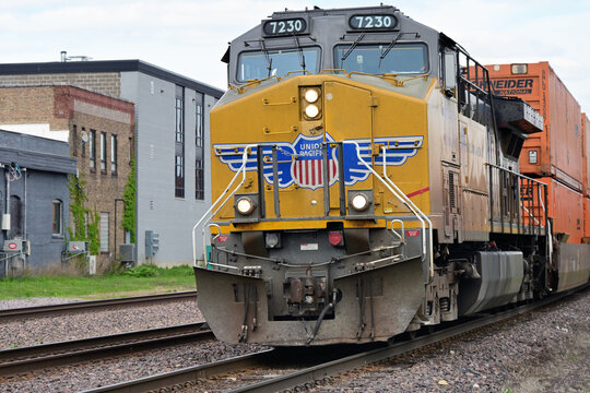 A single locomotive provides front-end power for a Union Pacific intermodal freight train on its outbound journey from Chicago.