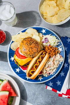 Patriotic Hot Dog and Cheeseburger with Beans and Pasta Salad