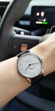 BANGKOK, THAILAND - MAY 7 : Nomos Orion, Germany made watch, manual winding mechanic, white silver dial with small second, minimal design, in Bangkok, Thailand, on May 7, 2026.