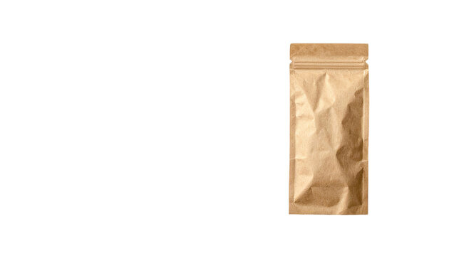 Close-up of a brown, crumpled paper pouch with a zip-top closure against a stark black background. The pouch's surface has folds