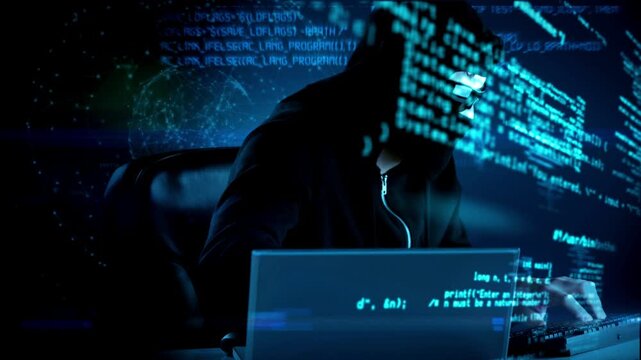 Green Screen Hacker Using Laptop with Cyber Attack HUD Composite Video Overlay in 4K Ultra HD footage
