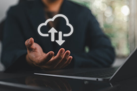Businessman presenting cloud computing technology with upload and download symbols, representing secure data storage, cloud infrastructure, file synchronization.