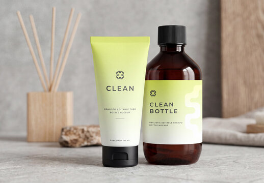 Cosmetic Glass Bottle and Cream Tube Packaging Mockup on Stone Surface