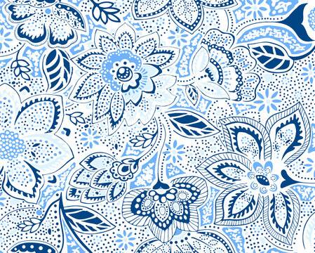 Intricate blue and white floral paisley seamless pattern on light background