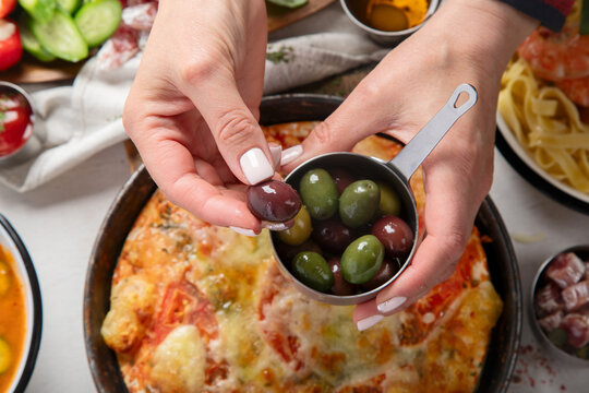 Italian cuisine. Pasta, pizza, olives and antipasto toasts.