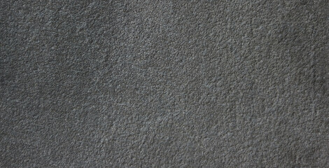 Dark gray felt texture background, charcoal wool fabric material, soft matte textile surface for fashion design and craft backdrop © Arbaz