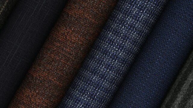 Elite fabric rolls from Italy showcasing remarkable textile artistry premium weave quality and refined luxury presentation