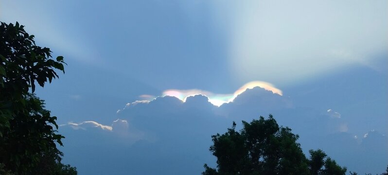 Rare Atmospheric Cloud Iridescence and Pileus Cloud Phenomenon
