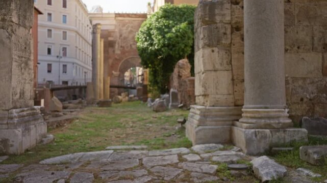 Defocused ancient roman ruins on a sunlit street with shallow bokeh and soft foreground blur; background backdrop copyspace backplate.