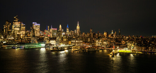 Obraz premium Manhattan at night. New York City aerial skyline. NYC landscape. Lower Manhattan aerial view. New York panoramic. New York night skyline.
