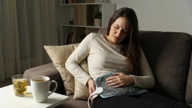 Suffering female individual: bladder infection, pain sensation, abdominal discomfort, urinary irritation, health condition, medical need, body ache, unwell state.