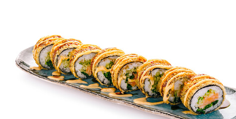 Fried crunchy tempura maki sushi rolls with sauce © AntAlexStudio