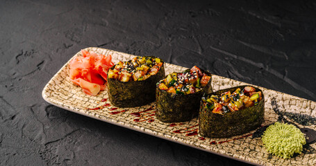 Gunkan maki sushi plate with ginger and wasabi © AntAlexStudio