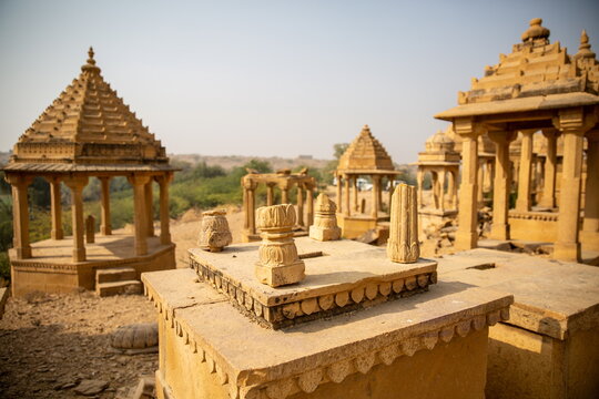Ancient golden sandstone chhatris royal cenotaphs at Bada Bagh architectural monument in Jaisalmer Rajasthan India Historic heritage site