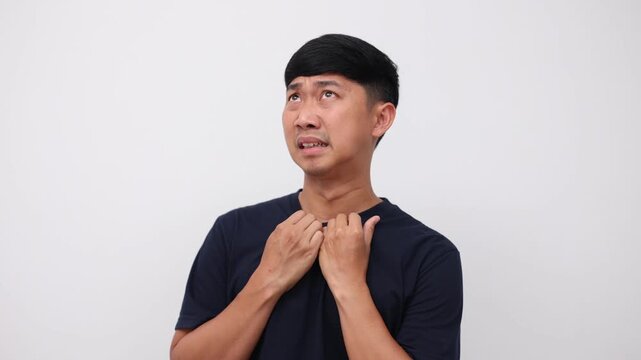 Young man black shirt feels scared looking around worry about attacked slow motion