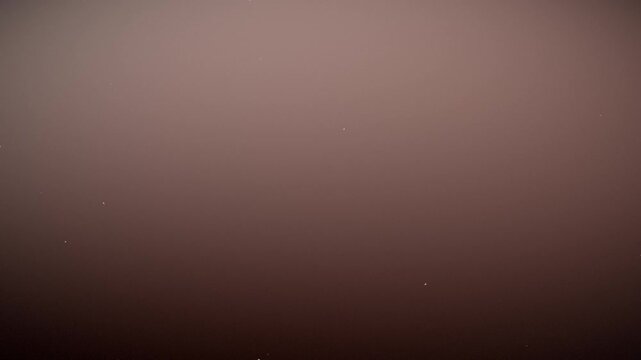 Abstract elegant brown gradient background with vintage film grain and subtle dust texture