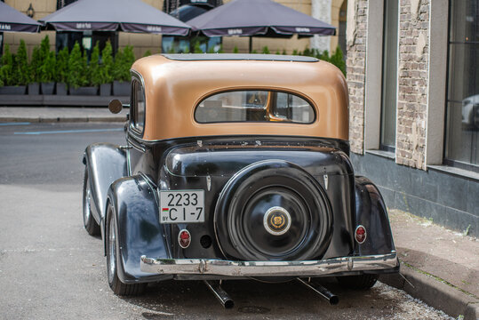 Minsk, Belarus - June 07 2026: Vintage Chevrolet classic car rear view on historic street