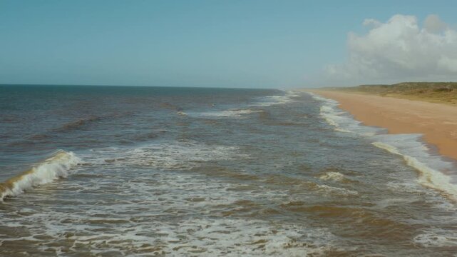 Panoramic Aerial Drone Shot of Uruguay's Playa Garzon Beach and Coastal Waters