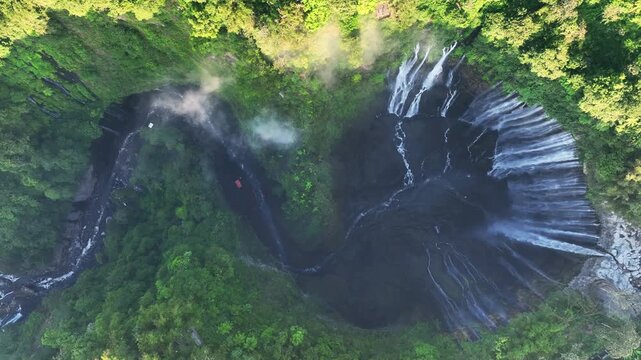 Aerial view of Tumpak Sewu Waterfalls in Indonesia.